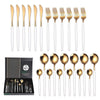 Black and Gold Stainless Steel Cutlery Set arranged in a 24-piece collection showing knives, forks, and spoons.