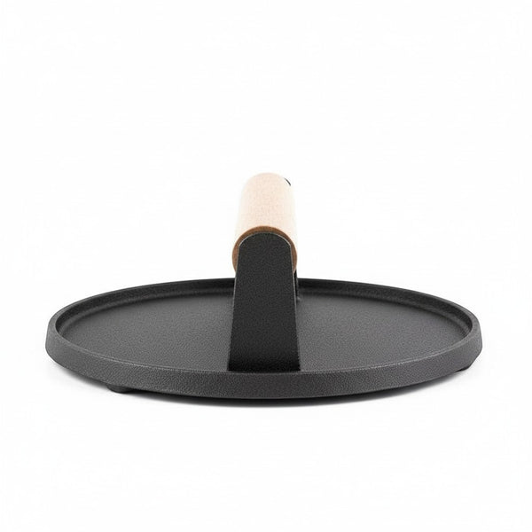 Round Cooking Press with Wooden Handle, sturdy kitchen tool for pressing food, featuring a wide base and wooden handle.
