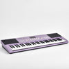 Portable Electronic Keyboard with built-in speakers and easy-to-access control panel, perfect for home music play.