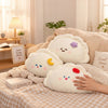 Dumpling Plush Throw Pillow set on a cozy sofa, showcasing cute, colorful faces and soft textures ideal for decoration.
