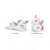 Slap Unicorn Bracelet: Two plush unicorns in flat and curled bracelet poses, showcasing their colorful designs and cute features.