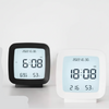 Digital Alarm Clock with Temperature and Humidity Display showing time, temperature, and humidity.