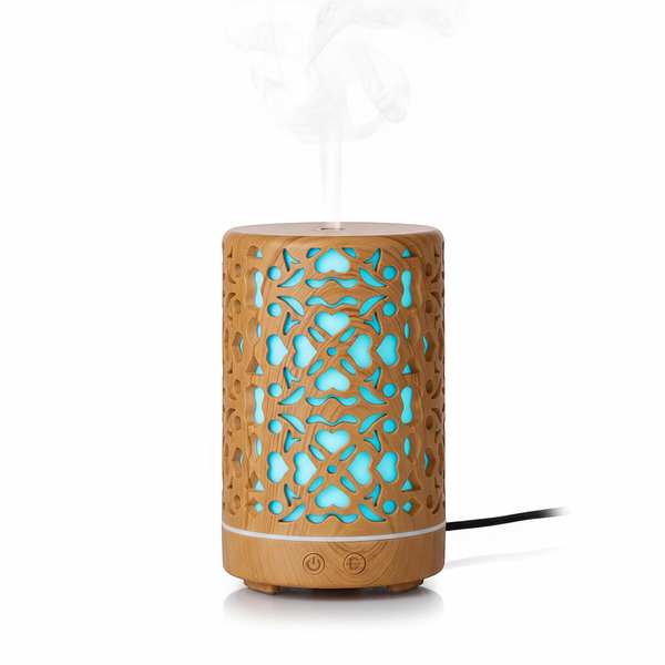 Compact Home & Office Air Humidifier with decorative design and blue LED light, enhancing indoor air quality.