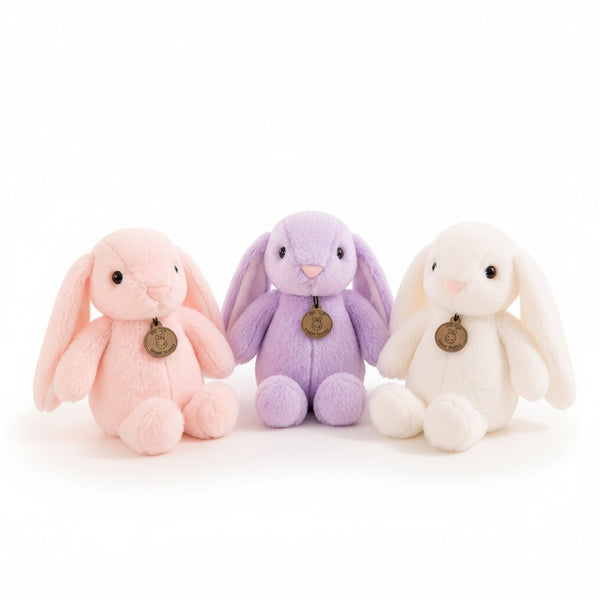Plush Bunny Toy collection featuring a pink, purple, and white bunny stuffed animal, perfect for children.