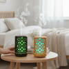 Compact Home & Office Air Humidifier on a table with steam rising, enhancing indoor air moisture in a cozy room.