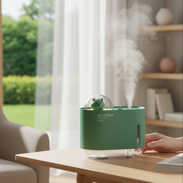 Bear Design Mini USB Humidifier with mist and bear figurine on a tabletop in a bright indoor setting.