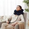 Person relaxing with Multi-Layered Inflatable Cervical Neck Traction Collar while seated in a cozy chair.