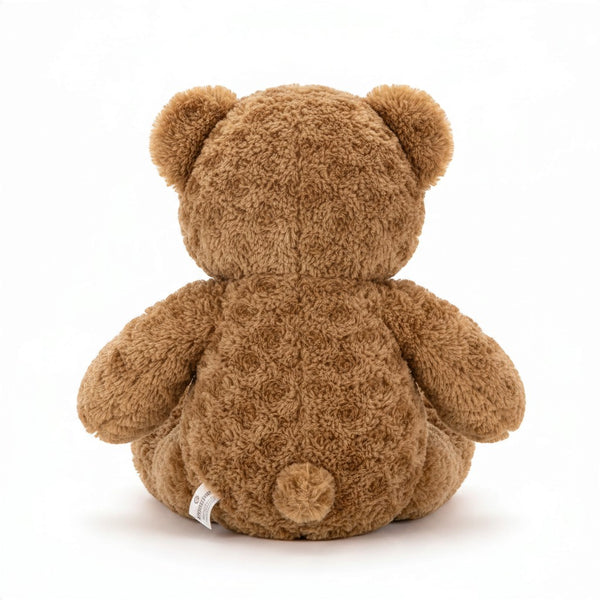 Back view of a 65cm Plush Teddy Bear showcasing its soft texture and adorable shape.