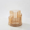 Clear Amber Rotating Makeup Brush Storage Bucket showcasing an elegant amber finish and smooth swivel base for organization.