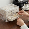 3-Tier Clear Acrylic Jewelry Box with Velvet Drawers displaying organized jewelry and velvet-lined drawers.