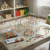 Colorful structures built with the 160-Piece Building Straws Construction Set on a classroom table.