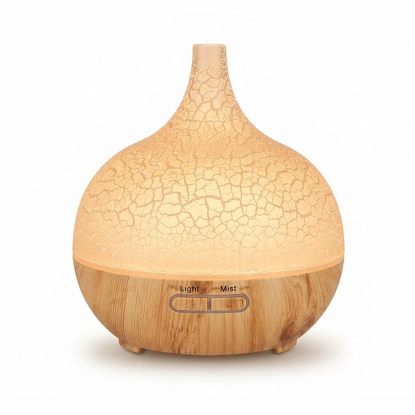 Ultrasonic Aroma Air Humidifier & Essential Oil Diffuser with warm ambient light and wooden base.