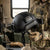 Military-Style Tactical Helmet held by an operator in tactical gear, showcasing its design for costume and display purposes.