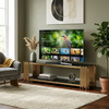 Gold Frame TV Stand with Black Glass Shelves showcasing a contemporary living room setup with a large TV.